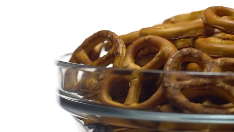 Pretzel salted in rotation. Close up. Studio shot. isolated on white. Stock Footage 102626429