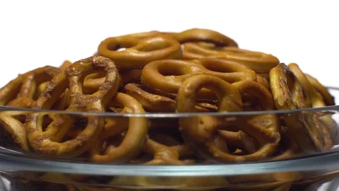 Pretzel salted in rotation. Close up. Studio shot. isolated on white. Stock Footage 102626443