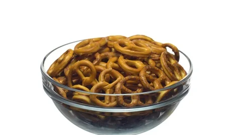 Pretzel salted in rotation. Close up. Studio shot. isolated on white. Stock Footage 102627208