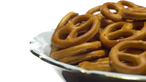 Pretzel salted in rotation. Close up. Studio shot. isolated on white. Stock Footage 102667625