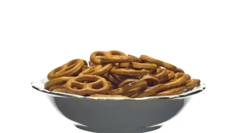Pretzel salted in rotation. Close up. Studio shot. isolated on white. Stock Footage 102667835