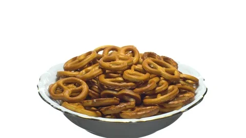 Pretzel salted in rotation. Close up. Studio shot. isolated on white. Stock Footage 102668610