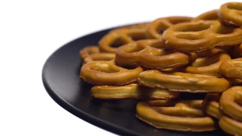 Pretzel salted in rotation. Close up. Studio shot. isolated on white. Stock Footage 102677577