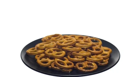 Pretzel salted in rotation. Close up. Studio shot. isolated on white. Stock Footage 102678180