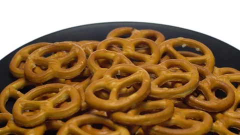 Pretzel salted in rotation. Close up. Studio shot. isolated on white. Stock Footage 102678244