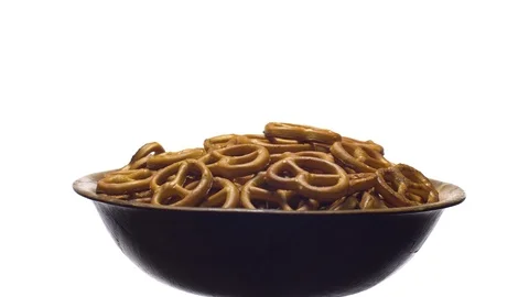 Pretzel salted in rotation. Close up. Studio shot. isolated on white. Stock Footage 102680165