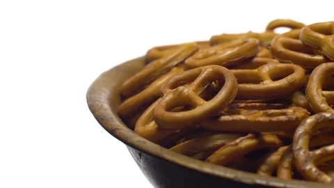 Pretzel salted in rotation. Close up. Studio shot. isolated on white. Stock Footage 102680351