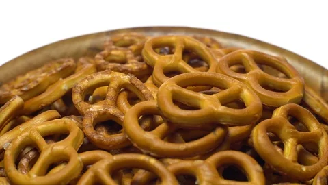 Pretzel salted in rotation. Close up. Studio shot. isolated on white. Stock Footage 102680728
