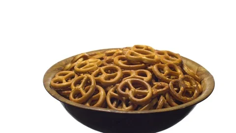 Pretzel salted in rotation. Close up. Studio shot. isolated on white. Stock Footage 102680799