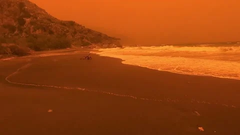 Preveli beach during red dust storm erminio on crete greece Stock Footage 333070572