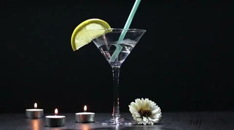 Prevented cocktail using a straw to drink. Still life Stock Footage 66636109