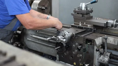 Prevention and maintenance of machine tools in the machine shop. A worker in Stock Footage 151758965