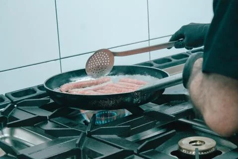 Preventive kitchen with latex gloves to avoid infections and contagions in ga Stock Photos