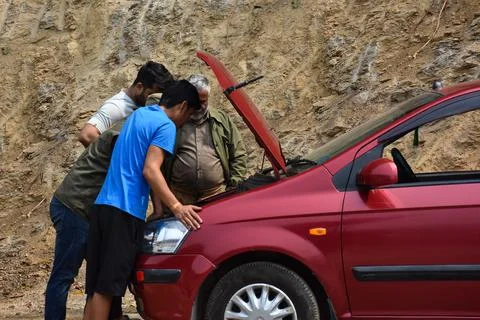 Preventive maintenance and inspection of car engine . Stock Photos