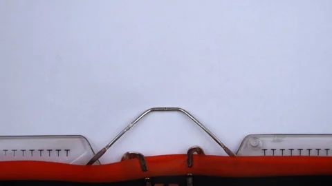 Price drop - phrase printed on an old typewriter in red letters, close up. Stock Footage 126509187