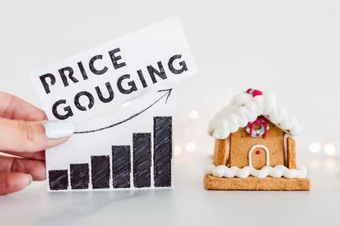 Price gouging graph with stats going up next to gingerbread house, cost of .. Stock Photos