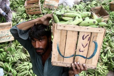 Prices of basic commodities increase in Pakistan as federal budget is released,  Stock Photos