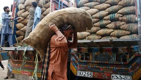 Prices of basic commodities increase in Pakistan as federal budget is released,  Stock Photos