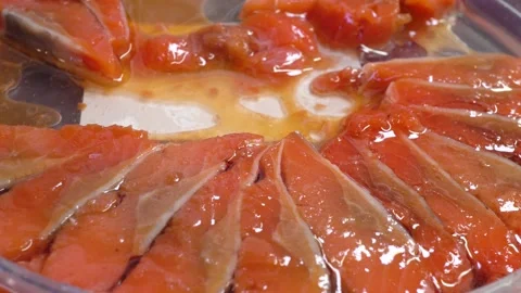 Prick with a fork salted herring or pieces of red salmon. macro view. Stock Footage 185052177