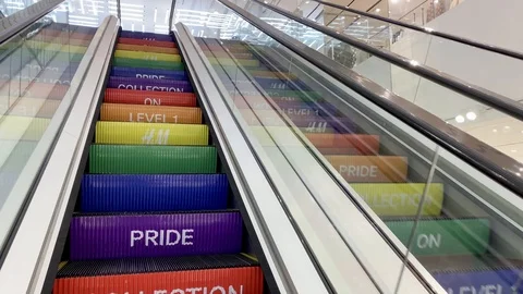 Pride color escalator steps in the mall, 4k Stock Footage 126560039