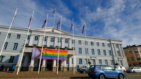 The Pride flag on the facade of Helsinki City Hall, Finland. Vídeo Stock 139012794