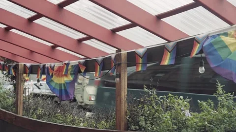 Pride flags on wooden Deck Blowing in wind Greenpoint Brooklyn 4k NYC Stock Footage 255754447