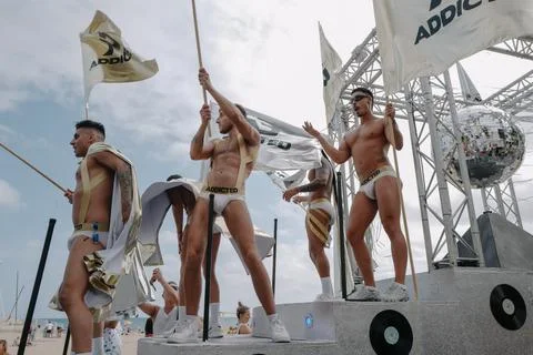 Pride float with cheering participants at Sitges Pride Parade, Spain Foto stock