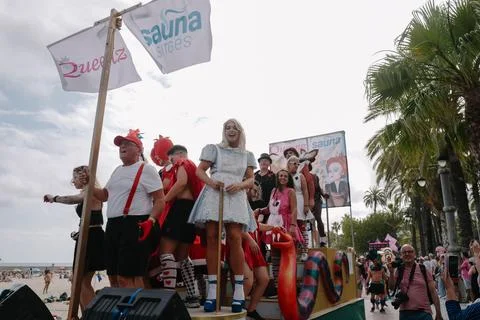 Pride float with cheering participants at Sitges Pride Parade, Spain Foto stock