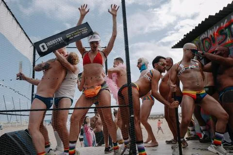 Pride float with cheering participants at Sitges Pride Parade, Spain Stock Photos