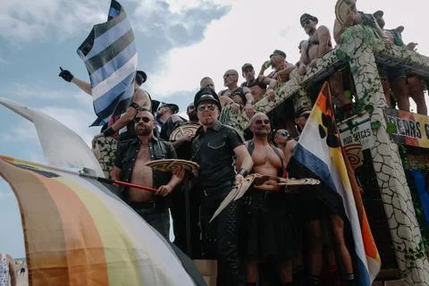 Pride float with cheering participants at Sitges Pride Parade, Spain Stock-Fotos