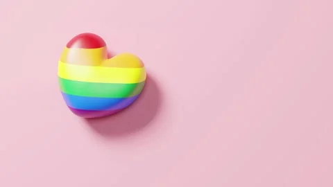 Pride month concept design of heart rainbow flag on pink background Stock Footage 339418574