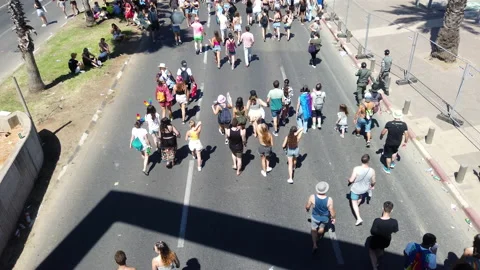 Pride parade procession moving from Rokach Boulevard to Yarkon park, panorama Stock Footage 197854768