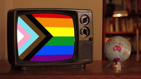 Pride Progress Flag Appearing on Retro TV With Spinning Globe Beside It, 4K Stock Footage 300788431