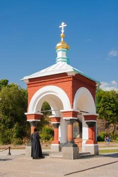 Priest baptized in front of the chapel. Chapel of All Who Sorrow joy. Russia, Foto stock