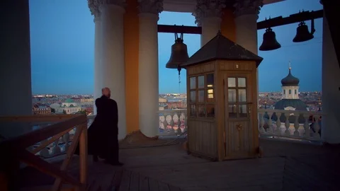 Priest in bell tower Video stock 81704092
