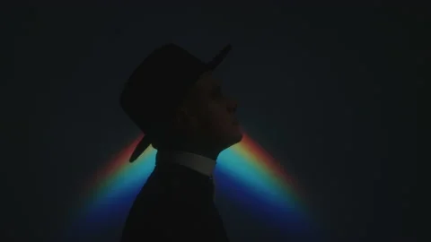 Priest In Rainbow Projection - Stock Video