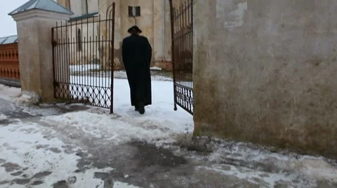 Priest going to the temple Stock Footage 8551246