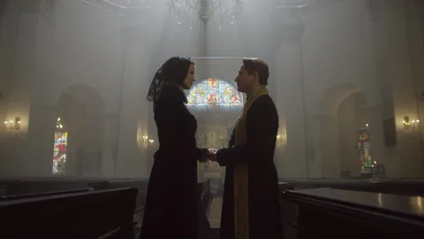 A priest helping a widow Stock Footage 283252237