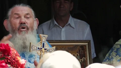 The priest instructing the congregation. Stock Footage 72375783