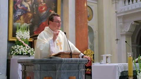 Priest is instructing the newlyweds. Stock Footage 132249055
