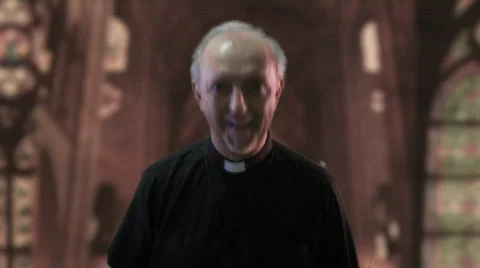 Priest laughing fixed Stock Footage
