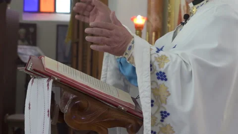 Priest preaches the scriptures Stock Footage 175381682