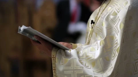 Priest read from the Scriptures during a religious weddings held in the smal 스톡 동영상 60055719