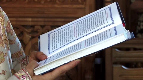 Priest read from the Scriptures during a religious weddings held in the small Stock Footage 60055756