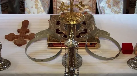 Priest read from the Scriptures during a religious weddings held in the small 스톡 동영상 60055761