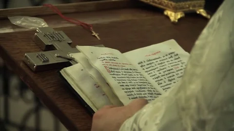 The priest is reading the prayer Stock Footage 70473788