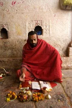Priest reading scripture in temple of Baba Baidyanath very famous One of t... Stock Photos