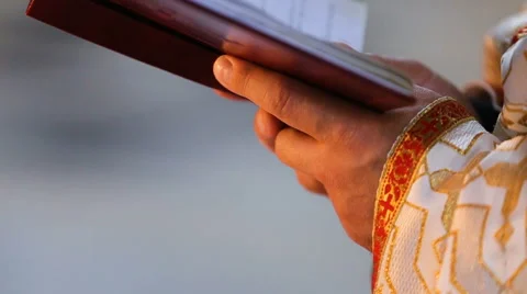 The priest reads the Bible Stock Footage 68627330