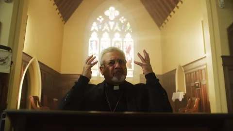 Priest talking about god in church Stock Footage 262287553