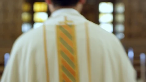 Priest walking down the aile Stock Footage 96249741